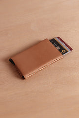 Leather pull up card holder by Cove