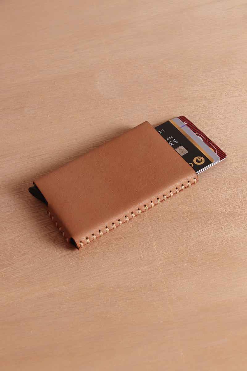 Leather pull up card holder by Cove